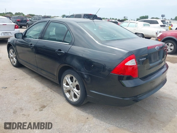 2012 Ford Fusion SE z VIN 3FAHP0HA4CR381213, wystawiony jako IAAI lot #42317783 z przebiegiem 193 816 mil mil oraz . Historia ofert i sprzedaży dostępna na DreamBid. Obrazek 3.
