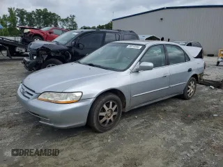 2002 Honda Accord SE z VIN 1HGCG66812A078598, wystawiony jako Copart lot #58018095 z przebiegiem 180 304 mil mil oraz Szkoda całkowita • Salvage title. Historia ofert i sprzedaży dostępna na DreamBid. Obrazek 1.