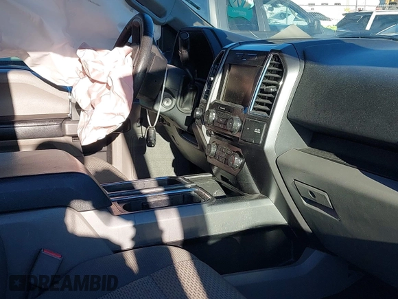 2015 Ford F-150 XLT with VIN 1FTFX1EF0FFB92972, listed as a IAAI auction lot 41366046 with 119,346 mi miles and . Bid and sale history available at DreamBid. Image 5.