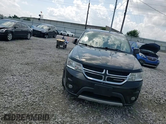 2013 Dodge Journey SXT with VIN 3C4PDDBG0DT532765, listed as a Copart auction lot 61481335 with 193,066 mi miles and Salvage title. Bid and sale history available at DreamBid. Image 14.