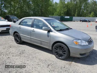 2004 Toyota Corolla CE with VIN 1NXBR32E44Z242342, listed as a Copart auction lot 56694425 with 240,081 mi miles and Clean Title. Bid and sale history available at DreamBid. Image 4.