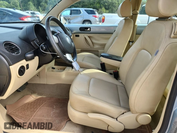 2010 Volkswagen Beetle with VIN 3VWRG3AG9AM018685, listed as a Copart auction lot 64543775 with 103,537 mi miles and Salvage title. Bid and sale history available at DreamBid. Image 7.