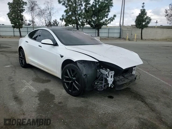 2022 Tesla Model S with VIN 5YJSA1E53NF492855, listed as a Copart auction lot 54545185 with 62,856 mi miles and Salvage title. Bid and sale history available at DreamBid. Image 14.