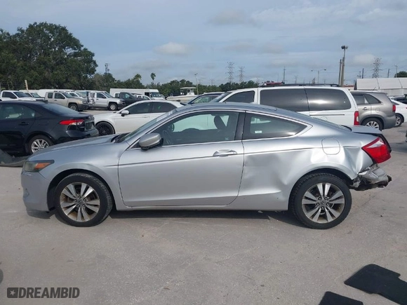 2009 Honda Accord Cpe EX-L with VIN 1HGCS12869A017331, listed as a IAAI auction lot 40432709 with NaN miles. Bid and sale history available at carsss.com. Image 15.