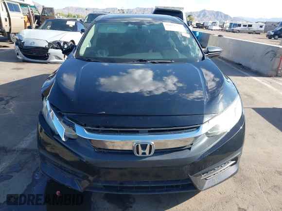 2018 Honda Civic EX with VIN 19XFC2F74JE021802, listed as a IAAI auction lot 42031745 with 102,986 mi miles and . Bid and sale history available at DreamBid. Image 11.