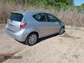 2013 Toyota Prius One with VIN JTDKDTB30D1047034, listed as a IAAI auction lot 42143557 with 186,866 mi miles. Bid and sale history available at carsss.com. Image 4.