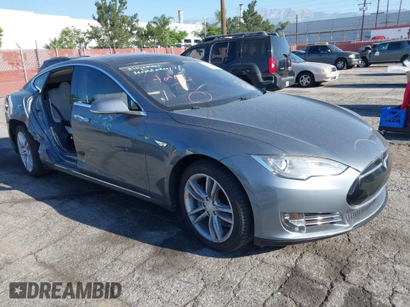 2014 Tesla Model S 60 with VIN 5YJSA1S11EFP35998, listed as a IAAI auction lot 42316563 with 83,835 mi miles and . Bid and sale history available at DreamBid. Image 1.