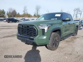2023 Toyota Tundra Limited with VIN 5TFJA5DBXPX081603, listed as a IAAI auction lot 41293156 with 15,155 mi miles and . Bid and sale history available at DreamBid. Image 2.