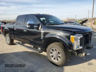 2017 Ford F-250 XL with VIN 1FT7W2A67HED56391, listed as a Copart auction lot 49100395 with 76,050 mi miles and Salvage title. Bid and sale history available at DreamBid. Image 4.