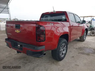 2015 Chevrolet Colorado 4WD Z71 with VIN 1GCGTCE38F1165453, listed as a IAAI auction lot 41548031 with 147,742 mi miles. Bid and sale history available at carsss.com. Image 4.