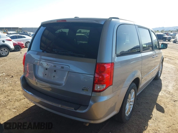 2015 Dodge Grand Caravan SXT with VIN 2C4RDGCG1FR649074, listed as a IAAI auction lot 41759409 with 116,856 mi miles and . Bid and sale history available at DreamBid. Image 4.