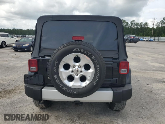 2013 Jeep Wrangler Unlimited Sahara with VIN 1C4HJWEG9DL701391, listed as a Copart auction lot 60492325 with 117,584 mi miles and Salvage title. Bid and sale history available at DreamBid. Image 6.