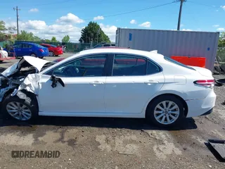 2019 Toyota Camry LE with VIN 4T1B11HK2KU187475, listed as a IAAI auction lot 42192293 with 44,413 mi miles and . Bid and sale history available at DreamBid. Image 14.