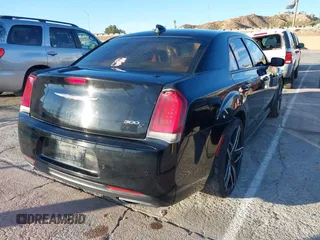 2016 Chrysler 300 S with VIN 2C3CCABG7GH144756, listed as a IAAI auction lot 41212951 with 126,349 mi miles and . Bid and sale history available at DreamBid. Image 4.