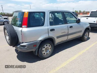 1999 Honda CR-V LX z VIN JHLRD2840XC020288, wystawiony jako IAAI lot #42350138 z przebiegiem 147 850 mil mil oraz . Historia ofert i sprzedaży dostępna na DreamBid. Obrazek 4.