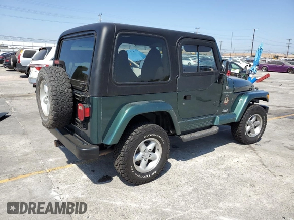 2000 Jeep Wrangler Sahara z VIN 1J4FA59S1YP746043, wystawiony jako Copart lot #58842665 z przebiegiem 148 348 mil mil oraz Szkoda całkowita • Salvage title. Historia ofert i sprzedaży dostępna na DreamBid. Obrazek 3.