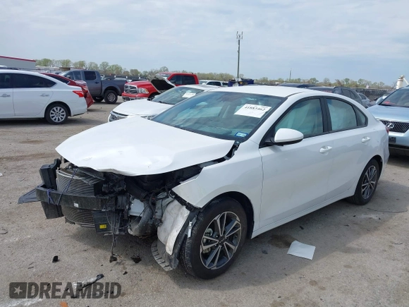 2024 Kia Forte LXS with VIN 3KPF24AD5RE812444, listed as a IAAI auction lot 41883462 with 13,091 mi miles and . Bid and sale history available at DreamBid. Image 2.