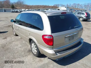 2006 Chrysler Town & Country Touring with VIN 2A8GP54L06R727898, listed as a IAAI auction lot 41893586 with 119,296 mi miles and . Bid and sale history available at DreamBid. Image 3.