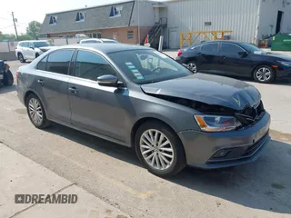 2015 Volkswagen Jetta SE with VIN 3VWD07AJ2FM310154, listed as a IAAI auction lot 42456136 with 96,979 mi miles and . Bid and sale history available at DreamBid. Image 1.