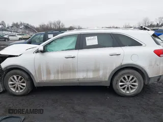 2018 Kia Sorento LX with VIN 5XYPGDA34JG423007, listed as a IAAI auction lot 41552932 with 106,027 mi miles. Bid and sale history available at carsss.com. Image 14.
