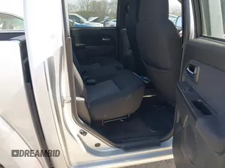 2010 GMC Canyon SLE1 z VIN 1GTJSCDEXA8130361, wystawiony jako IAAI lot #41734671 z przebiegiem 52 621 mil mil oraz . Historia ofert i sprzedaży dostępna na DreamBid. Obrazek 8.