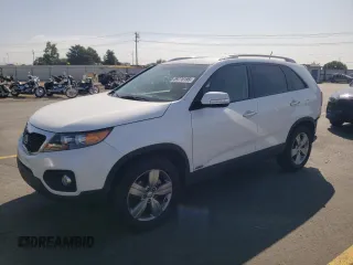2012 Kia Sorento EX z VIN 5XYKUDA62CG289372, wystawiony jako Copart lot #59776195 z przebiegiem 74 316 mil mil oraz Szkoda całkowita • Salvage title. Historia ofert i sprzedaży dostępna na DreamBid. Obrazek 1.