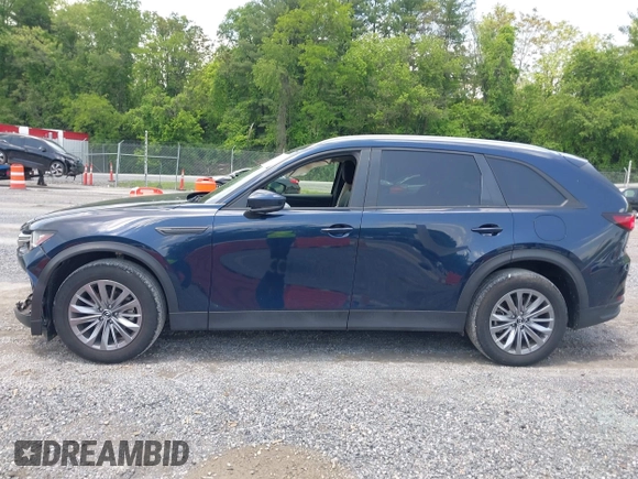 2024 Mazda CX-90 Select z VIN JM3KKAHD4R1142933, wystawiony jako IAAI lot #42269979 z przebiegiem 30 373 mil mil oraz . Historia ofert i sprzedaży dostępna na DreamBid. Obrazek 14.