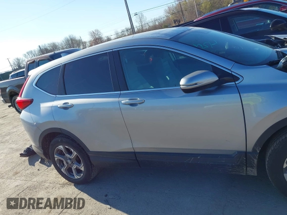 2018 Honda CR-V EX with VIN 7FARW2H56JE097214, listed as a IAAI auction lot 42061999 with 74,862 mi miles and . Bid and sale history available at DreamBid. Image 14.