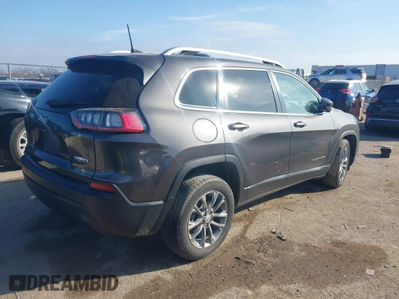 2020 Jeep Cherokee Latitude Plus with VIN 1C4PJLLB1LD623909, listed as a IAAI auction lot 41233277 with 134,889 mi miles. Bid and sale history available at carsss.com. Image 4.
