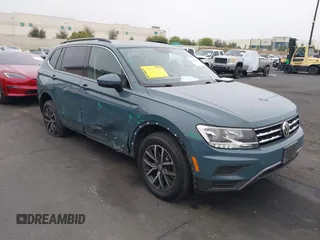 2019 Volkswagen Tiguan SE with VIN 3VV3B7AX3KM113955, listed as a IAAI auction lot 42164890 with 77,806 mi miles and . Bid and sale history available at DreamBid. Image 14.