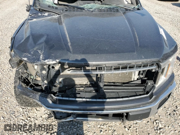 2020 Ford F-150 XL с VIN 1FTEW1EP3LKE89499, выставлен на аукционе Copart как лот 61428475 с пробегом Не указан миль и Списание • Salvage title. История ставок и продаж доступна на DreamBid. Изображение 11.