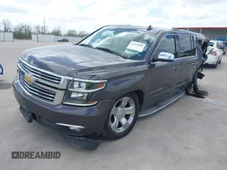 2015 Chevrolet Suburban LTZ with VIN 1GNSCKKC9FR500933, listed as a IAAI auction lot 41830980 with 169,217 mi miles and . Bid and sale history available at DreamBid. Image 2.