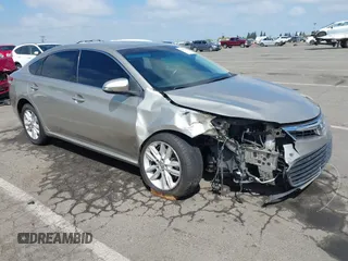 2015 Toyota Avalon Limited with VIN 4T1BK1EB2FU145153, listed as a IAAI auction lot 42073193 with 102,814 mi miles and . Bid and sale history available at DreamBid. Image 1.