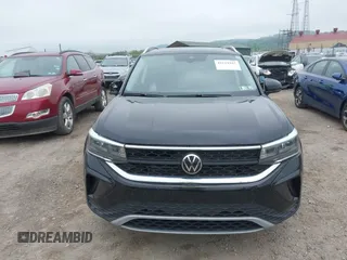 2023 Volkswagen Taos SE z VIN 3VVNX7B22PM330188, wystawiony jako IAAI lot #42219485 z przebiegiem 26 166 mil mil oraz . Historia ofert i sprzedaży dostępna na DreamBid. Obrazek 12.
