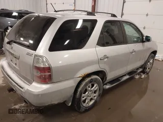 2004 Acura MDX Touring Pkg w/Navigation with VIN 2HNYD18874H506394, listed as a IAAI auction lot 41589065 with 211,253 mi miles. Bid and sale history available at carsss.com. Image 4.