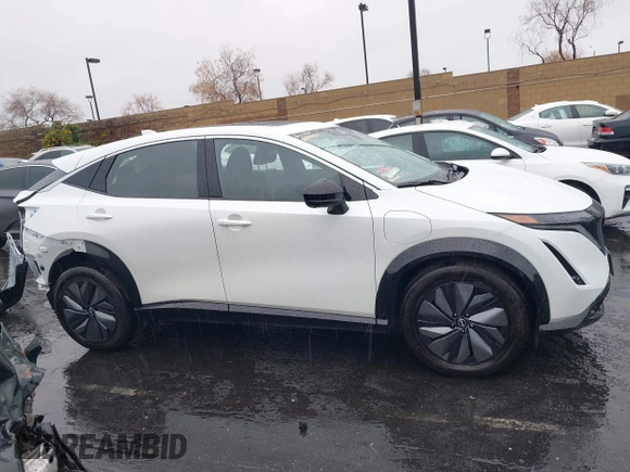 2024 Nissan ARIYA Evolve+ z VIN JN1BF0BAXRM435453, wystawiony jako IAAI lot #41745123 z przebiegiem 5 565 mil mil oraz . Historia ofert i sprzedaży dostępna na DreamBid. Obrazek 14.