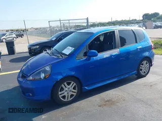 2007 Honda Fit Sport z VIN JHMGD38637S015957, wystawiony jako IAAI lot #42284728 z przebiegiem 176 383 mil mil oraz . Historia ofert i sprzedaży dostępna na DreamBid. Obrazek 2.