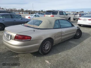 2004 Chrysler Sebring LX with VIN 1C3EL45X84N380308, listed as a Copart auction lot 87330434 with 81,169 mi miles and Salvage Title. Bid and sale history available at carsss.com. Image 3.