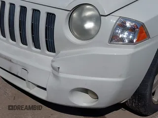 2008 Jeep Compass Sport with VIN 1J8FT47W08D676237, listed as a IAAI auction lot 41862908 with 206,531 mi miles. Bid and sale history available at carsss.com. Image 13.