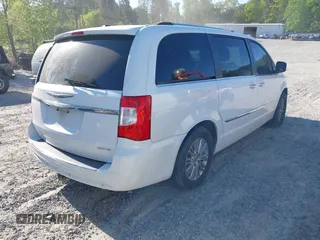 2014 Chrysler Town & Country Limited with VIN 2C4RC1GG8ER332790, listed as a IAAI auction lot 42050062 with 168,048 mi miles. Bid and sale history available at carsss.com. Image 4.