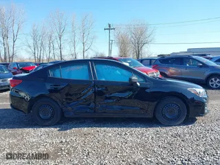 2017 Subaru Impreza with VIN 4S3GKAA68H1605729, listed as a IAAI auction lot 41190447 with 118,115 mi miles. Bid and sale history available at carsss.com. Image 13.