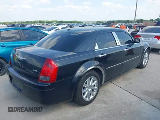 2007 Chrysler 300 with VIN 2C3LA43R57H875094, listed as a IAAI auction lot 42059007 with 125,067 mi miles. Bid and sale history available at carsss.com. Image 4.