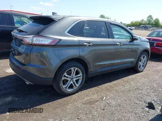 2015 Ford Edge Titanium z VIN 2FMPK4K83FBB30411, wystawiony jako IAAI lot #42230235 z przebiegiem 69 094 mil mil oraz . Historia ofert i sprzedaży dostępna na DreamBid. Obrazek 4.