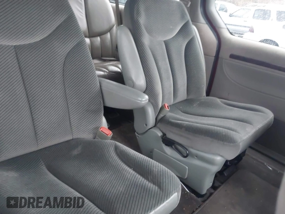 1999 Chrysler Town & Country with VIN 1C4GT64L7XB723937, listed as a IAAI auction lot 41609957 with 242,800 mi miles and . Bid and sale history available at DreamBid. Image 8.