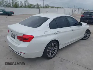 2017 BMW 3 Series 330i with VIN WBA8B9G51HNU09431, listed as a IAAI auction lot 41869627 with 87,719 mi miles. Bid and sale history available at carsss.com. Image 4.