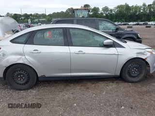 2012 Ford Focus SE with VIN 1FAHP3F29CL353872, listed as a IAAI auction lot 42528943 with Not provided miles and . Bid and sale history available at DreamBid. Image 6.