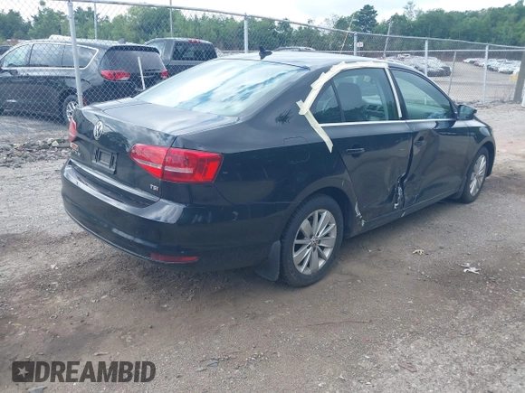 2015 Volkswagen Jetta SE z VIN 3VWD17AJXFM338250, wystawiony jako IAAI lot #42651860 z przebiegiem 119 751 mil mil oraz . Historia ofert i sprzedaży dostępna na DreamBid. Obrazek 4.