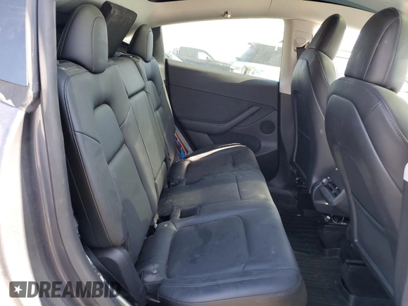 2022 Tesla Model Y Long Range z VIN 7SAYGDEE6NF429701, wystawiony jako Copart lot #58585665 z przebiegiem 86 537 mil mil oraz Szkoda całkowita • Salvage title. Historia ofert i sprzedaży dostępna na DreamBid. Obrazek 10.