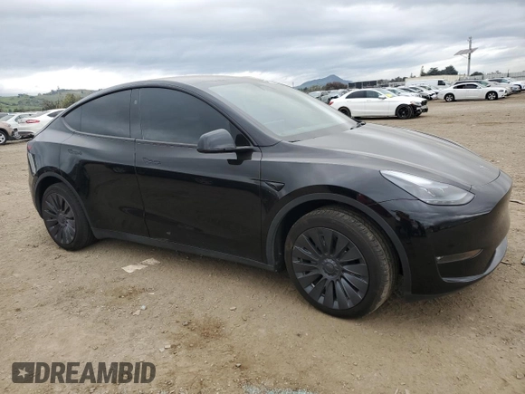 2023 Tesla Model Y Long Range with VIN 7SAYGDEE1PF923998, listed as a Copart auction lot 48954205 with 21,525 mi miles and Salvage Title. Bid and sale history available at DreamBid. Image 4.
