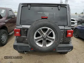 2018 Jeep Wrangler Unlimited Sahara with VIN 1C4HJXEN7JW295223, listed as a Copart auction lot 57385265 with 29,662 mi miles and Salvage title. Bid and sale history available at DreamBid. Image 6.